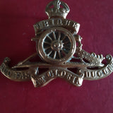 Original WW2 cap badge Royal Artillery with moving wheel