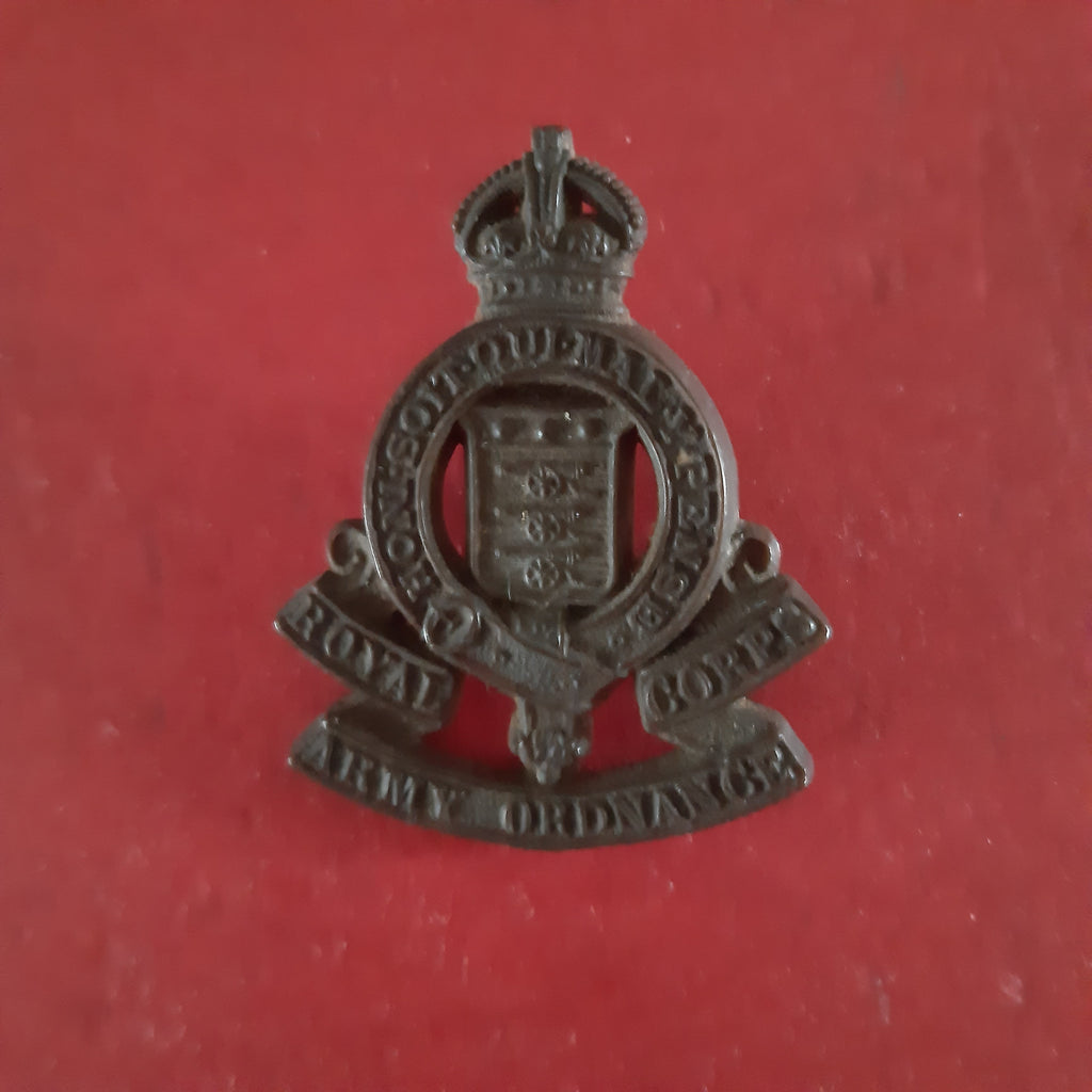 Original plastic WW2 cap badge Royal Army Ordnance Corps